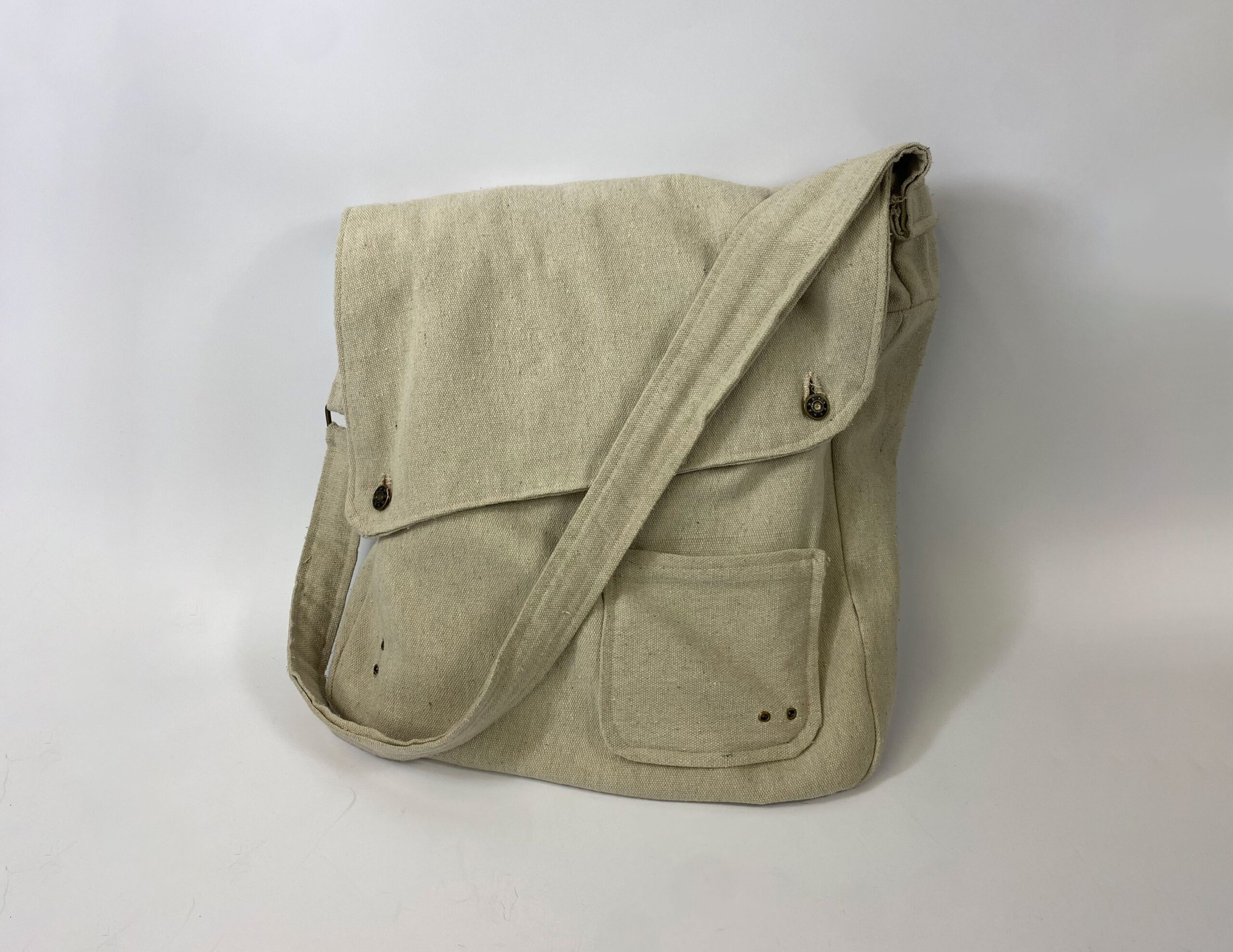 front view of bag with strap hanging over front
